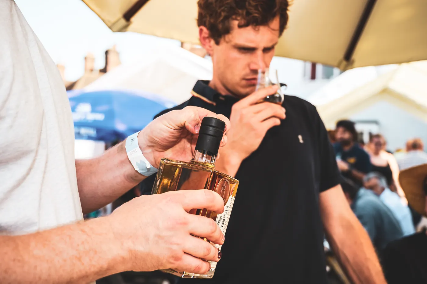 A guest nosing a dram at the Summerton Whisky Festival